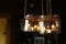 Aromatic candles in jars hanging in interior.