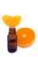 Aromatic essence oil and fresh orange segment