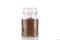 The aromatic granules of instant coffee are in a glass jar.