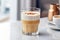 Aromatic latte composition: coffee with milk in a glass