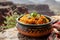 Aromatic Malian Jollof Rice Served in a Traditional Clay Pot Against a Canyon Backdrop