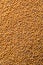 Aromatic mustard grains as background, top view