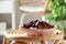 Aromatic potpourri of dried flowers in bowl on wicker table indoors