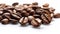 aromatic roasted coffee beans against a plain white background