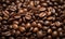Aromatic roasted coffee beans close-up background