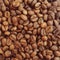 Aromatic roasted coffee beans. Healthy diet. Photo background