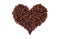 Aromatic roasted coffee beans in a heart shape