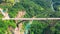 Around on the Djurdjevic Bridge in Montenegro is a concrete arch bridge across the Tara River. Aerial drone view.