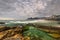 Arpoador Beach Rocks and Dramatic Sky Above Rio de Janeiro