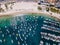 Arraial do Cabo Brazil. Praia dos Anjos. Aerial drone photo from above. Beach ocean and fishing boats.