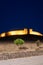 Arraiolos village castle with lights at night in Alentejo, Portugal