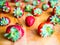 Arranged strawberries on a wooden board