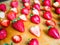 Arranged strawberries on a wooden board