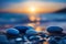 An arrangement of blue stones along the shores of a cool beach