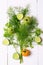 Arrangement fennel coriander tomato cucumber on white background top view of the wooden flat style