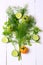 Arrangement fennel coriander tomato cucumber on white background top view of the wooden flat style