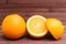 Arrangement of orange isolated on wooden background. Healthy food. A mix of fresh fruit. Group of citrus fruits. Vegetarian, raw.