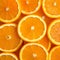 Arrangement of orange slices, forming a visually appealing and vibrant composition.