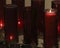 An Arrangement of Prayer Candles in a Church
