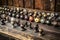 array of antique door knobs on a rustic table