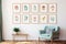 An array of bohemian minimalist blank wood framed prints on a white wall