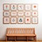 An array of bohemian minimalist blank wood framed prints on a white wall