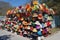 an array of colorful and unusual hats on display at an roadside attraction