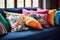 an array of colourful throw pillows on a daybed