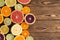 Array of fresh juicy halved citrus fruits