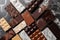 array of gourmet chocolate bars on marble countertop