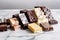 array of gourmet chocolate bars on marble countertop