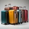 Array of luggage Suitcases neatly arranged on a clean white backdrop