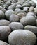 Array of pedestrian stone. The pebble round shaped stock photo