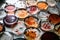 array of petri dishes, each one showcasing a different microbe and its growth patterns