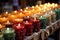 array of scented christmas candles at a market stall