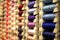 Array of Spools of Vibrantly Colored Sewing Thread