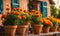 An array of terracotta flowerpots cradling an assortment of colorful flowers, captured with a shallow depth of field