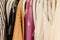 Array of vibrant shirts displayed in a neat and organized fashion on a clothing rack