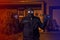 Arrested masked thief in balaclava with crowbar and raised arms