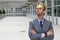 Arrogant businessman with a crown in office space