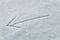 Arrow drawn on a snow