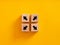 Arrow icons on wooden cubes moving to opposite directions