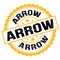 ARROW text on yellow-black round stamp sign