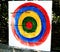 Arrows in a homemade painted target for children`s competition