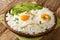Arroz con huevo is a popular lazy lunch throughout Latin America, consisting of rice thatâ€™s topped with a fried egg close up in