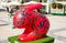 Art 3D shape Easter Bunny in red and painted black ragged lines. Beautiful Easter art