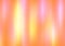 Art abstract background with defocused yellow and orange ray of light. Red flash illuminated backdrop