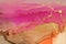 Art Abstract painting blots horizontal background. Alcohol ink pink and gold colors. Marble texture