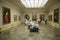 Art appreciators view paintings in Museum de Prado, Prado Museum, Madrid, Spain