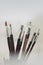 Art brushes close-up in a light haze. Creative idea in art concept.